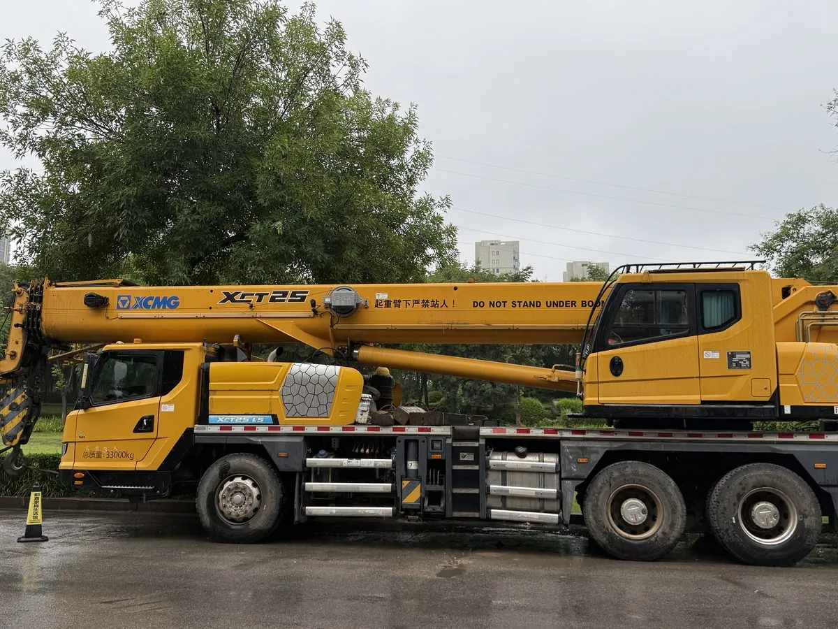Mobile crane in yard — boom retracted